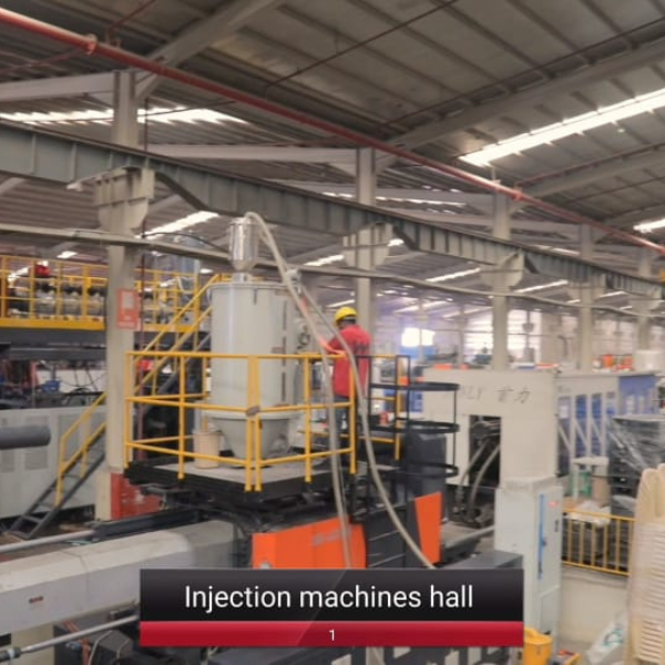 Industrial injection molding machines hall with automated production systems