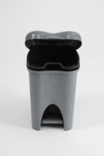 small dustbin with pedal in grey plastic, featuring a domed lid and front foot pedal for hands‑free opening