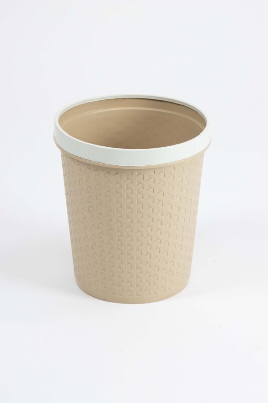 Rattan waste bin in beige plastic with faux‑rattan textured sides and contrasting light rim, ideal for office or bedroom use